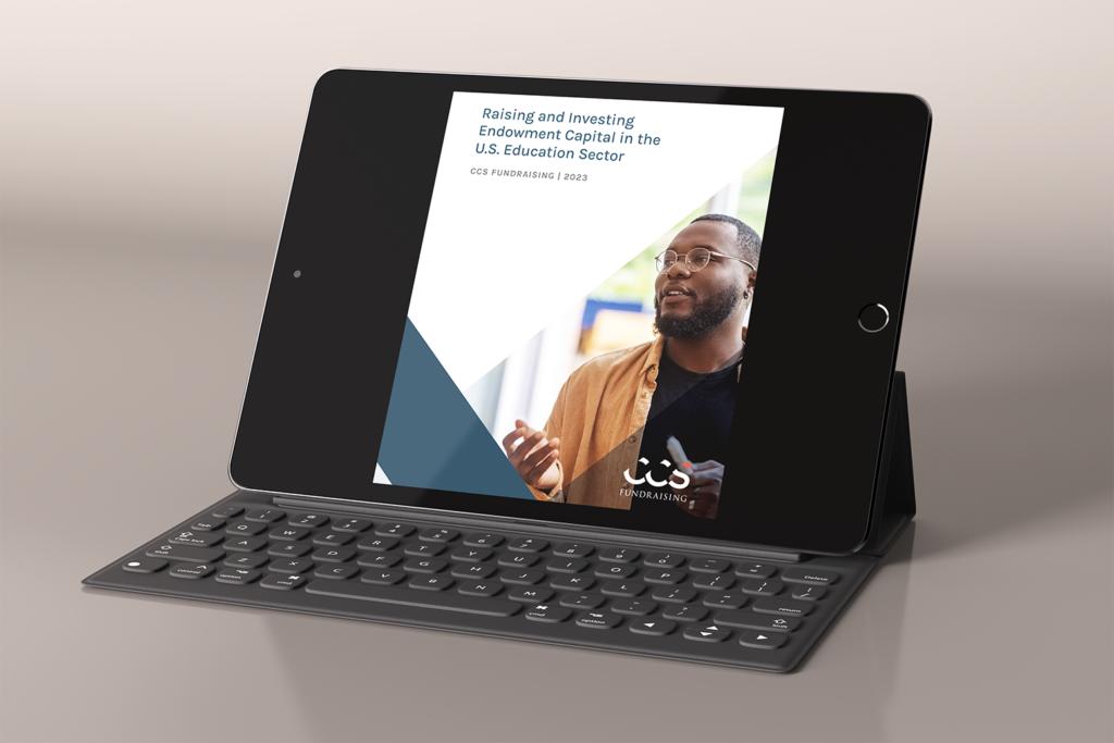 An iPad showing the front cover of CCS's August 2023 "Raising and Investing Endowment Capital in the U.S. Education Sector" whitepaper.