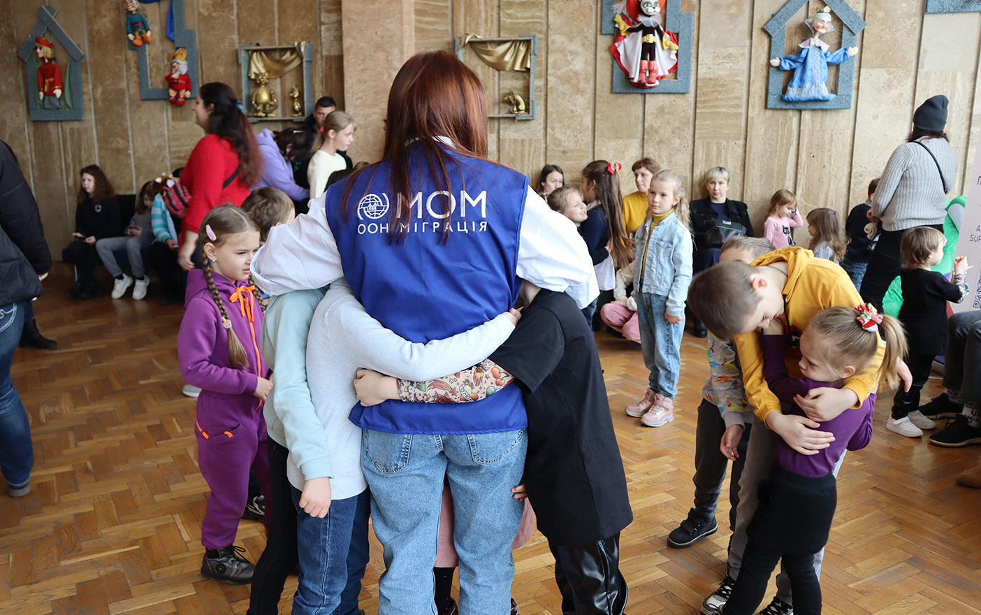 USA for IOM worker with children.