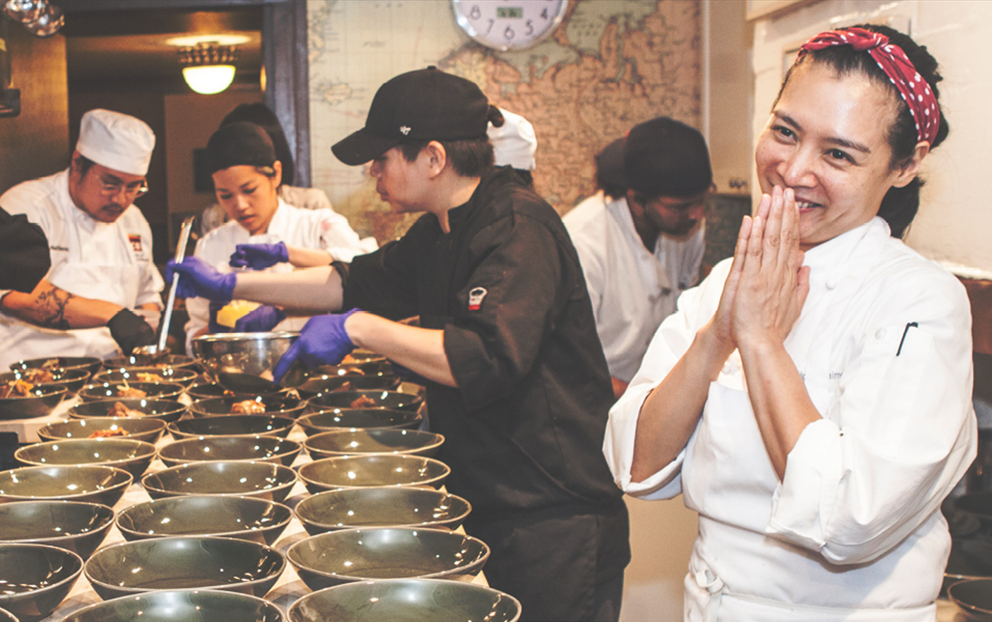 A picture of chefs working in a kitchen.